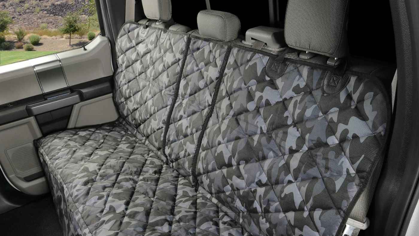 4Knines waterproof dog seat cover in truck backseat with quilted camo design for water dog protection.