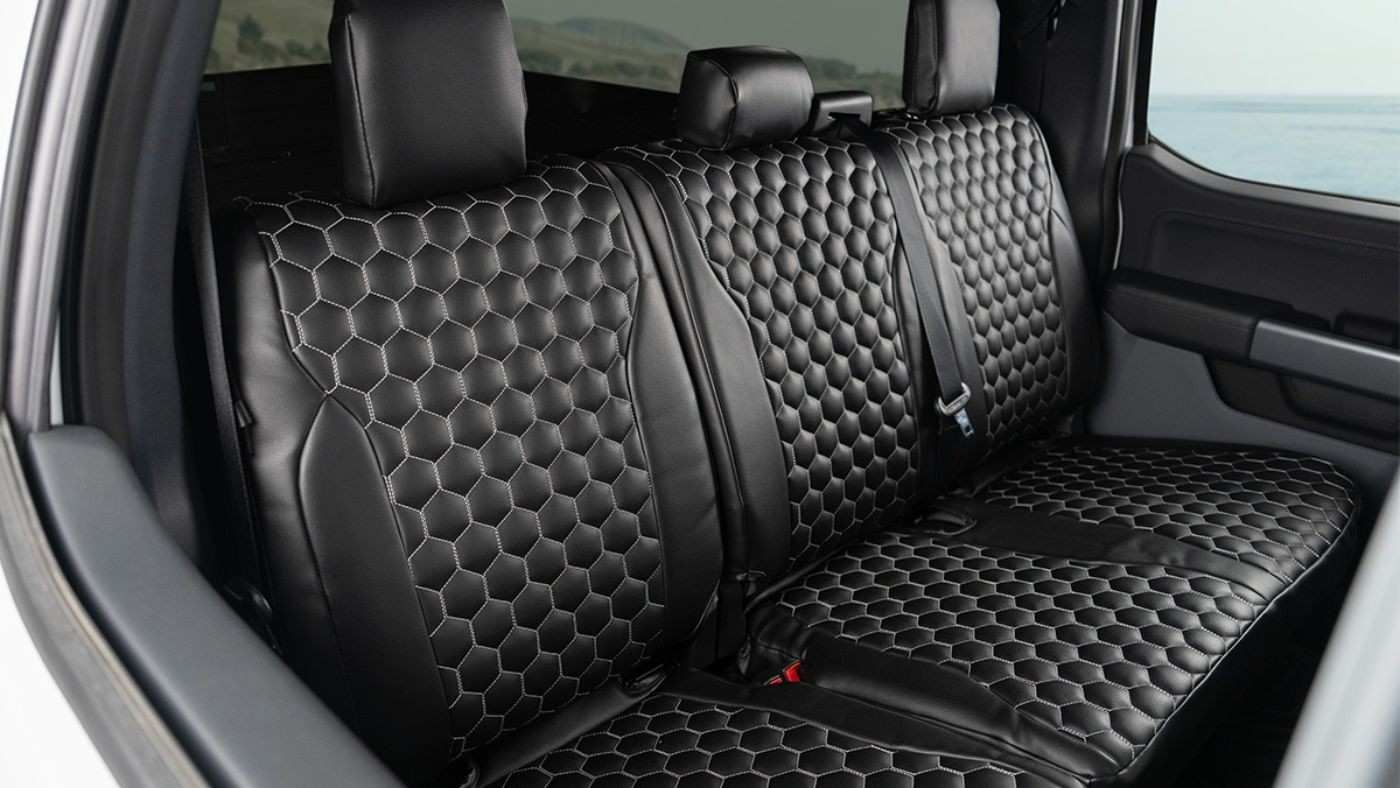 Ruff Tuff heavy duty dog seat cover on rear bench, built for active medium dogs with claw resistant protection.