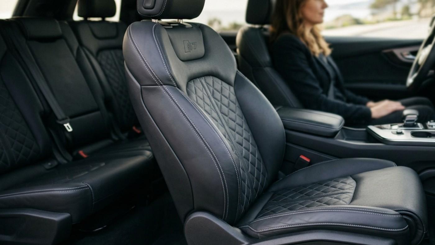 Ford F-150 Lariat SuperCrew rear and front leather seats showing quilted design, highlighting wear-prone areas in daily use.