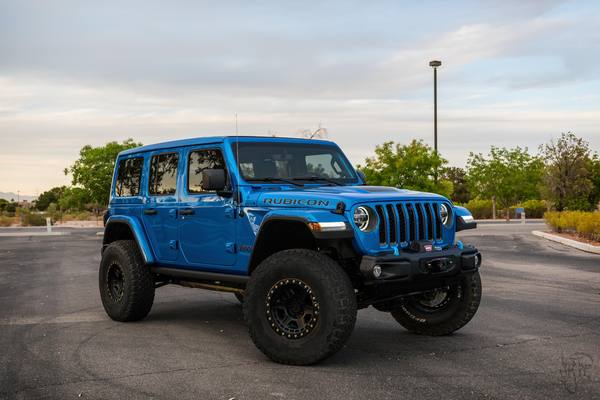 Jeep Wrangler in Hydro Blue distinctive color, showcasing the vibrant exterior paint option