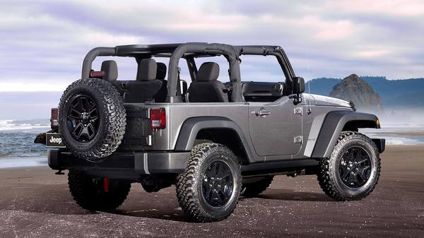 Jeep Wrangler with removable soft top, showcasing the iconic open-air driving feature