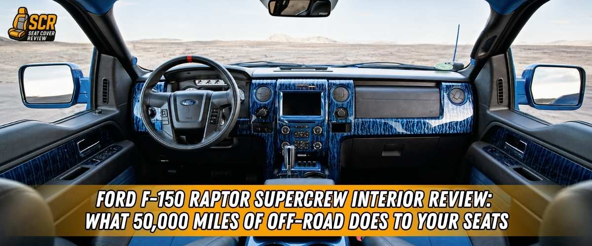 Ford F-150 Raptor SuperCrew interior showing off-road wear and fitted seat covers protecting the cabin from dust and cargo.