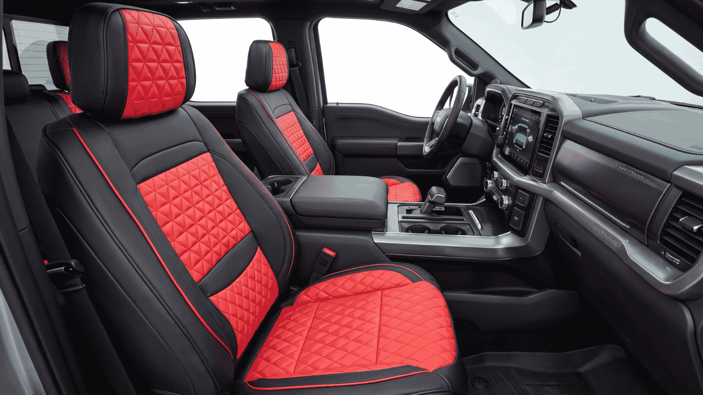 Ford F-150 Lightning interior with red custom seat covers built for daily EV truck use, errands, and cabin wear.