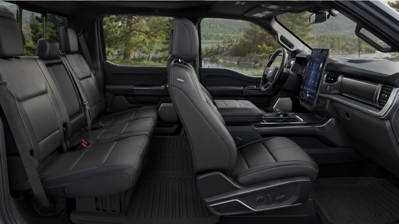 Ford F-150 Lightning Lariat interior with front and rear seating areas that reveal real-world family use after one year.