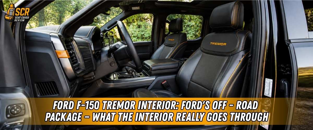 Ford F-150 Tremor interior with rugged black seats, showing off-road cabin wear and seat protection for trail use.