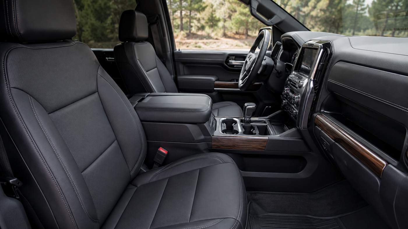 Clean Silverado 1500 LTZ Interior featuring leather seats before bolster creasing and perforation wear become visible.
