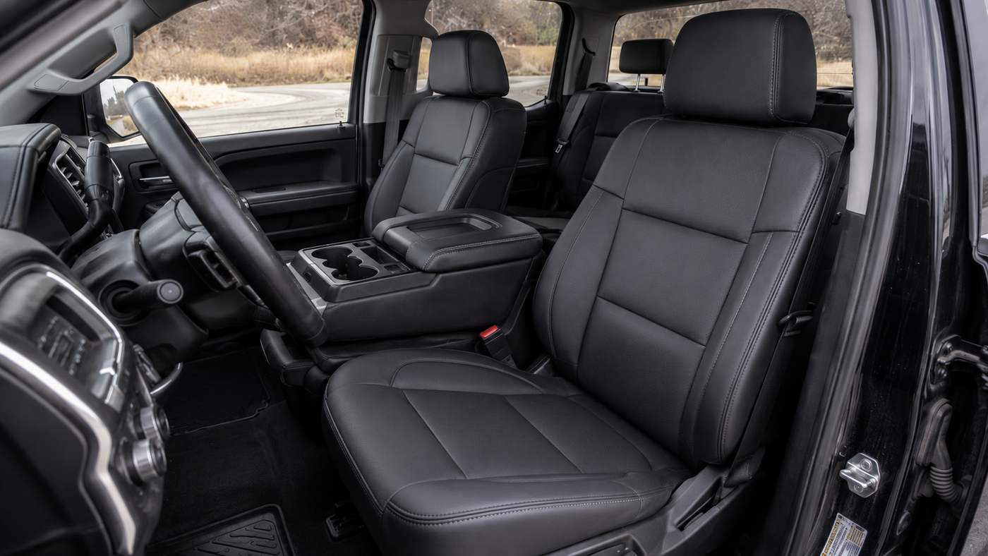 Custom-fit Silverado 1500 Crew Cab Seat Covers protecting front seats with a clean OEM inspired finish.
